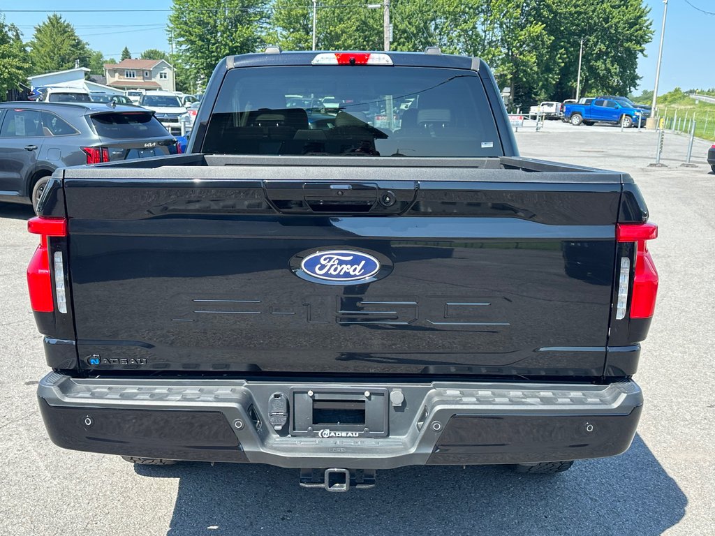 Ford F-150 Lightning Flash GROSSE BATTERIE AWD 2024 à St-Jean-Sur-Richelieu, Québec - 9 - w1024h768px