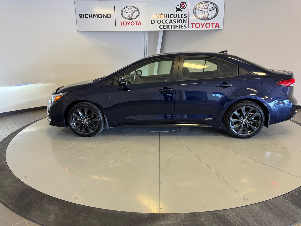 Toyota Corolla XSE HYBRIDE AWD *SEULEMENT 1,800 KM* 2025 à Richmond, Québec - 4 - w1024h768px