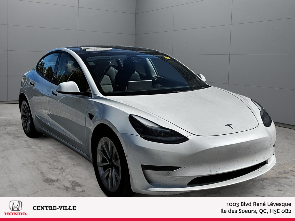 2021 Tesla Model 3 in Montreal, Quebec - 2 - w1024h768px