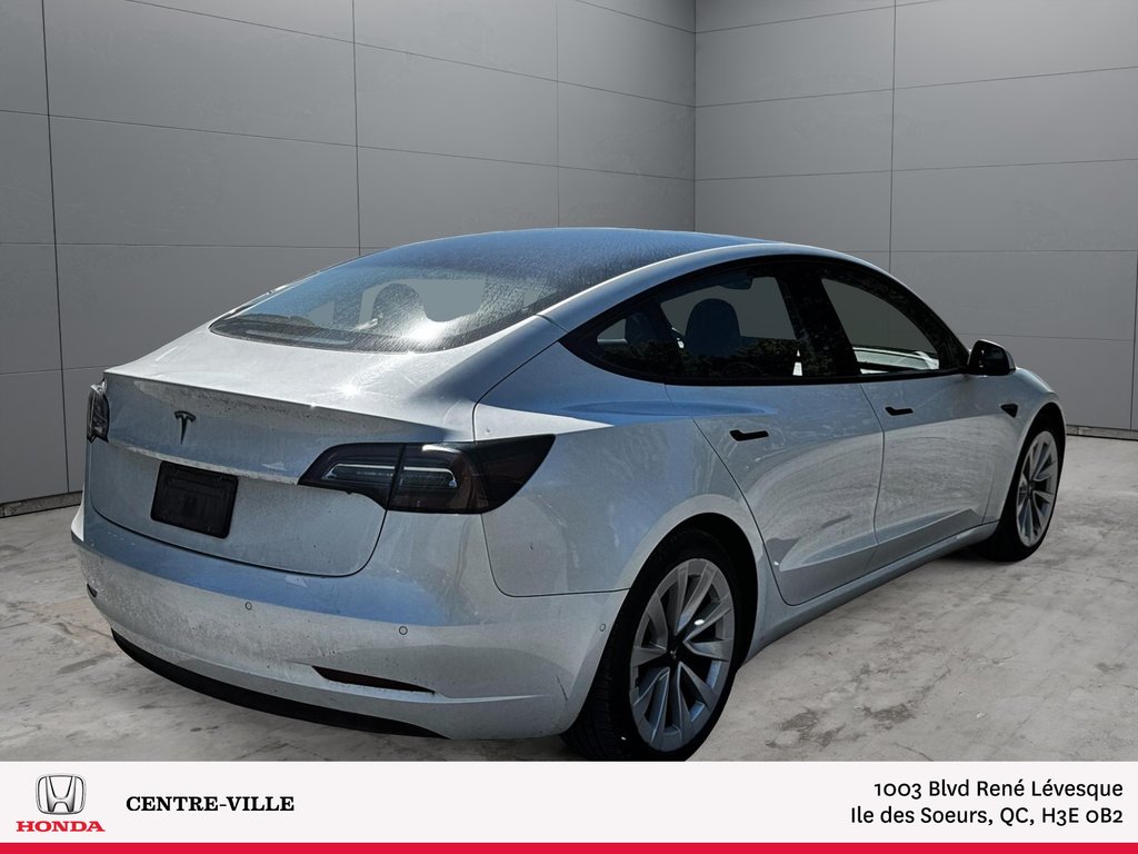2021 Tesla Model 3 in Montreal, Quebec - 3 - w1024h768px