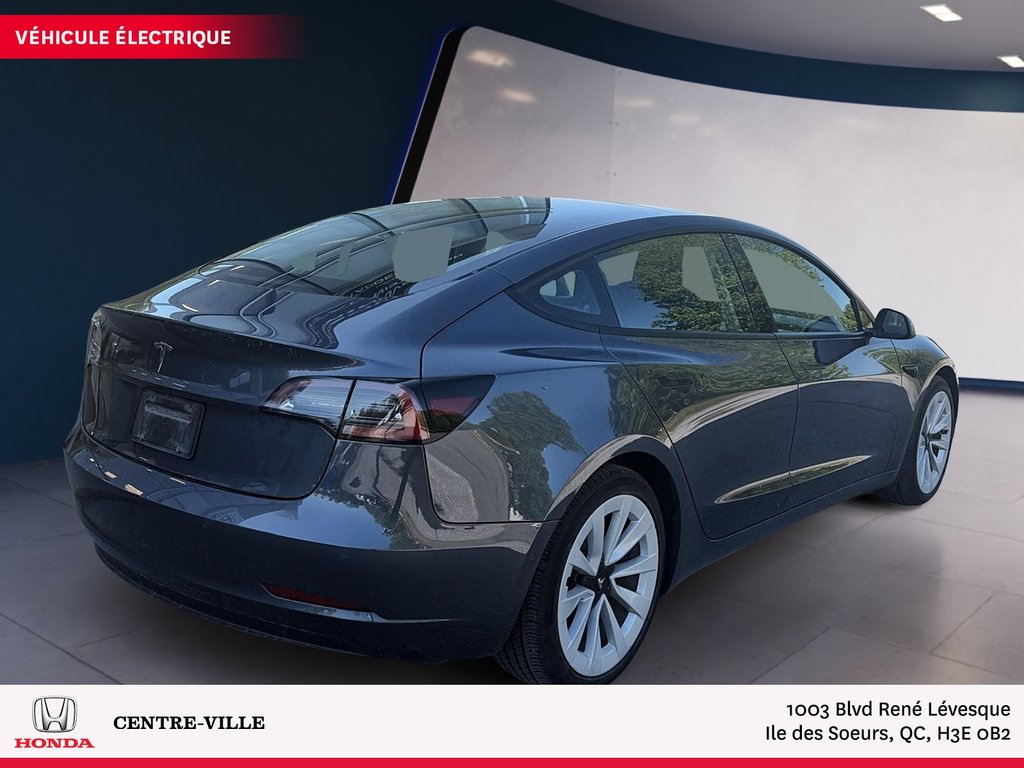2022 Tesla Model 3 BASE in Montreal, Quebec - 3 - w1024h768px