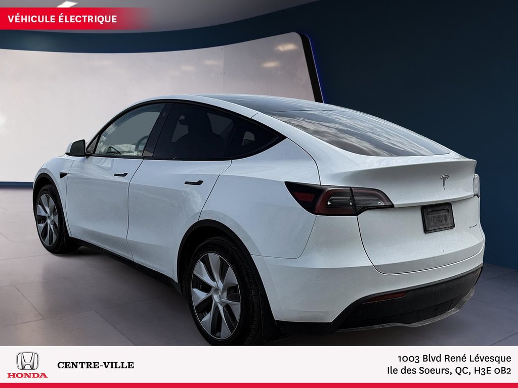 2023 Tesla Model Y Long Range in Montreal, Quebec - 4 - w1024h768px
