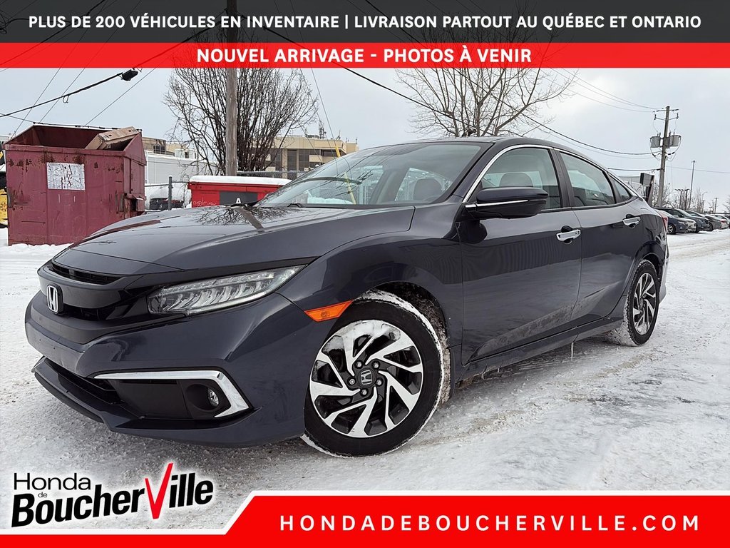 2020 Honda CIVIC TOURING in Terrebonne, Quebec - 1 - w1024h768px