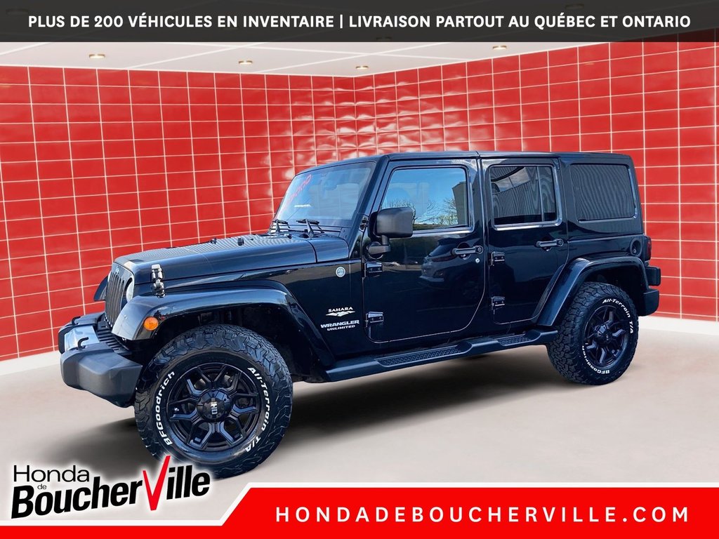 2014 Jeep Wrangler Unlimited Sahara in Terrebonne, Quebec - 1 - w1024h768px