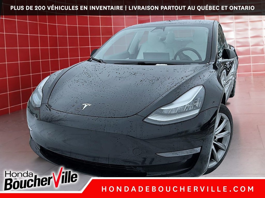 Tesla Model 3 Standard Range Plus 2019 à Terrebonne, Québec - 3 - w1024h768px