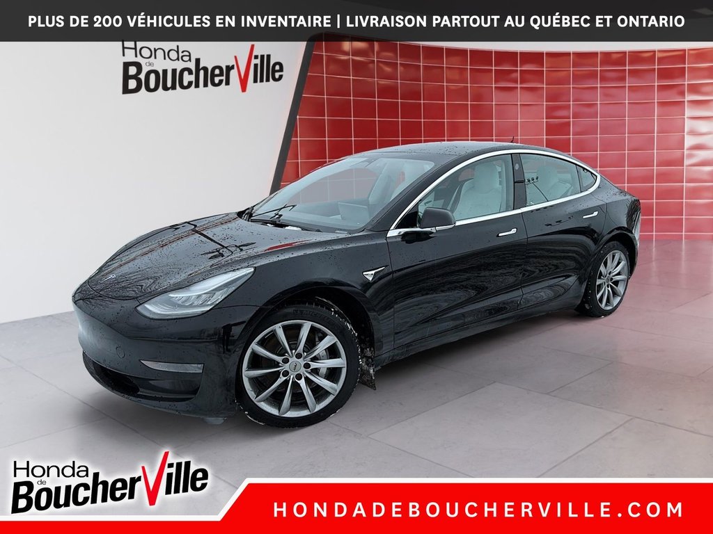Tesla Model 3 Standard Range Plus 2019 à Terrebonne, Québec - 1 - w1024h768px