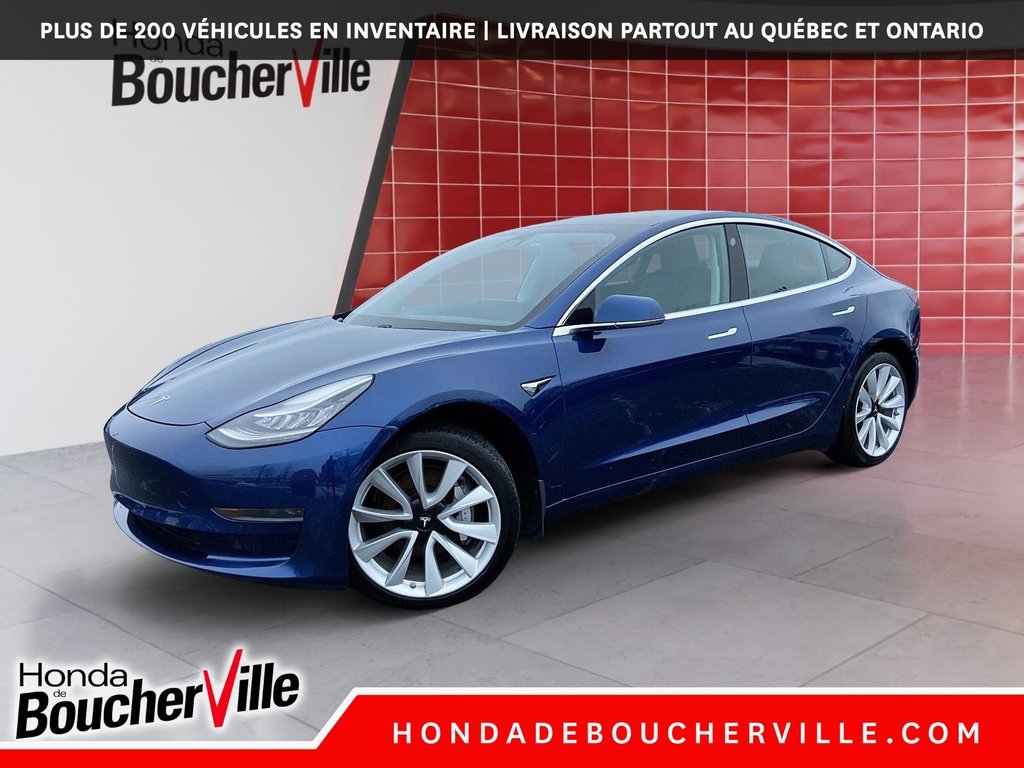 2020 Tesla MODEL 3 Standard Range Plus in Terrebonne, Quebec - 1 - w1024h768px