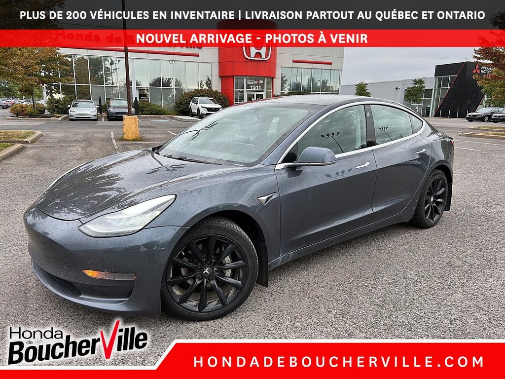2020 Tesla MODEL 3 Standard Range Plus in Terrebonne, Quebec - 1 - w1024h768px
