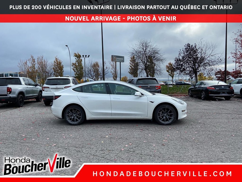 2020 Tesla Model 3 Standard Range Plus in Terrebonne, Quebec - 5 - w1024h768px