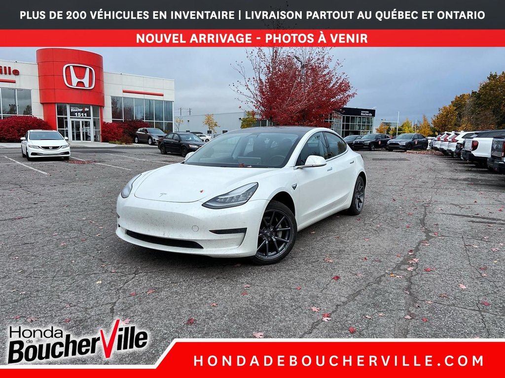 2020 Tesla Model 3 Standard Range Plus in Terrebonne, Quebec - 1 - w1024h768px