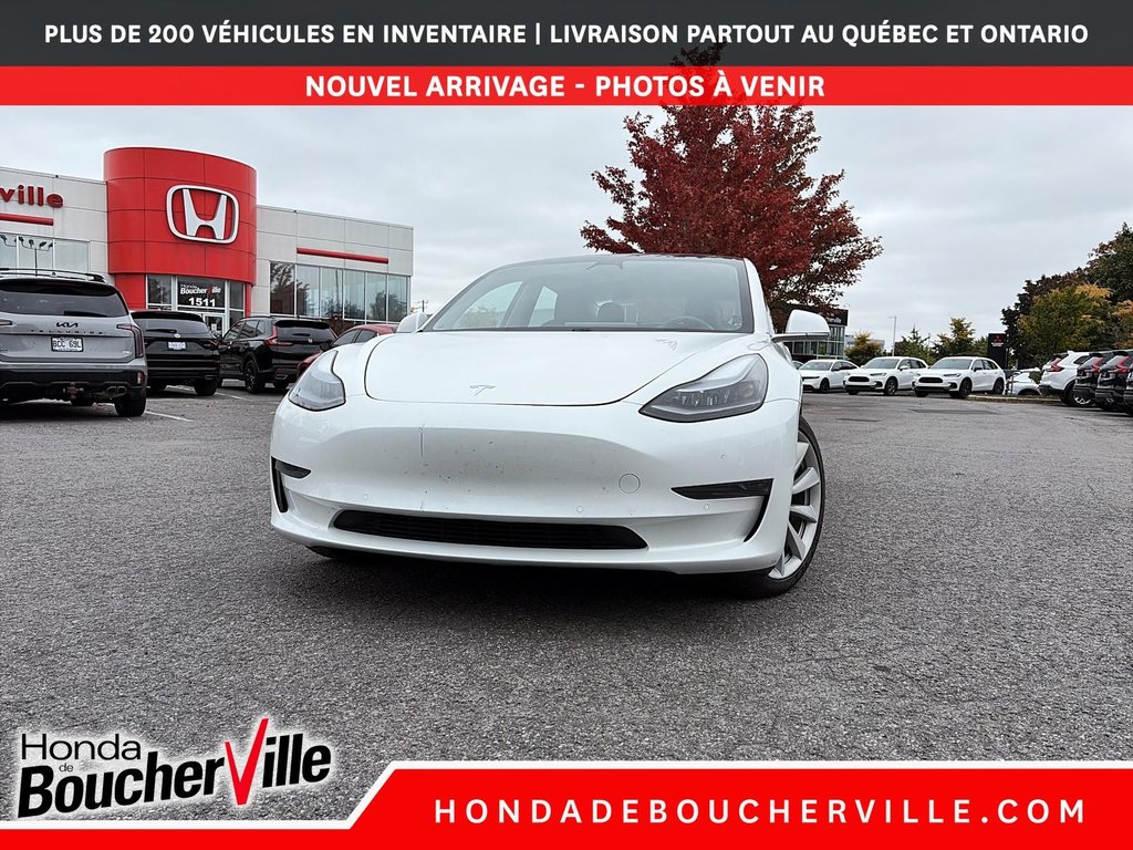 2020 Tesla Model 3 Standard Range Plus in Terrebonne, Quebec - 2 - w1024h768px