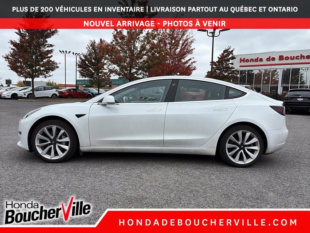 2020 Tesla Model 3 Standard Range Plus in Terrebonne, Quebec - 3 - w1024h768px