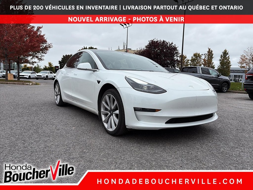 2020 Tesla Model 3 Standard Range Plus in Terrebonne, Quebec - 11 - w1024h768px
