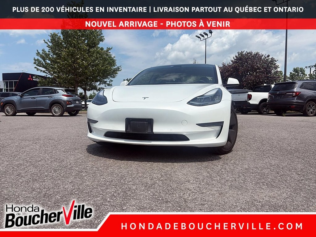 2021 Tesla Model 3 STANDARD RANGE PLUS in Terrebonne, Quebec - 2 - w1024h768px
