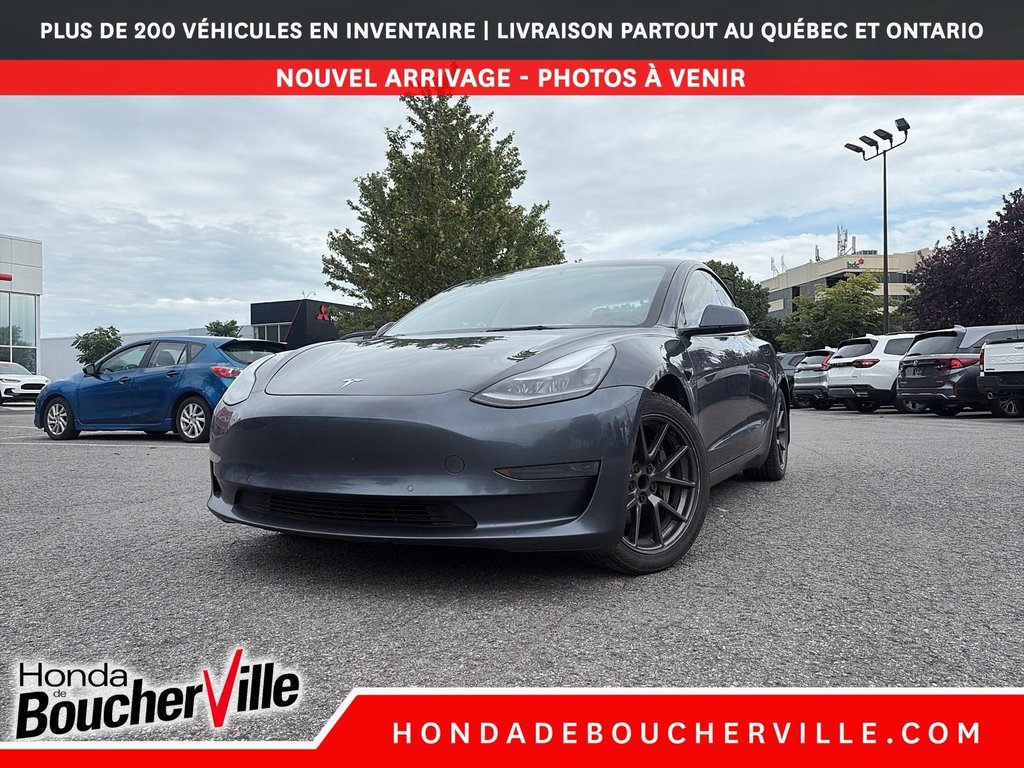 2021 Tesla Model 3 STANDARD RANGE PLUS in Terrebonne, Quebec - 1 - w1024h768px