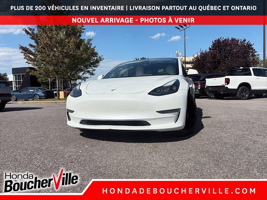 2021 Tesla Model 3 STANDARD RANGE PLUS in Terrebonne, Quebec - 2 - w1024h768px