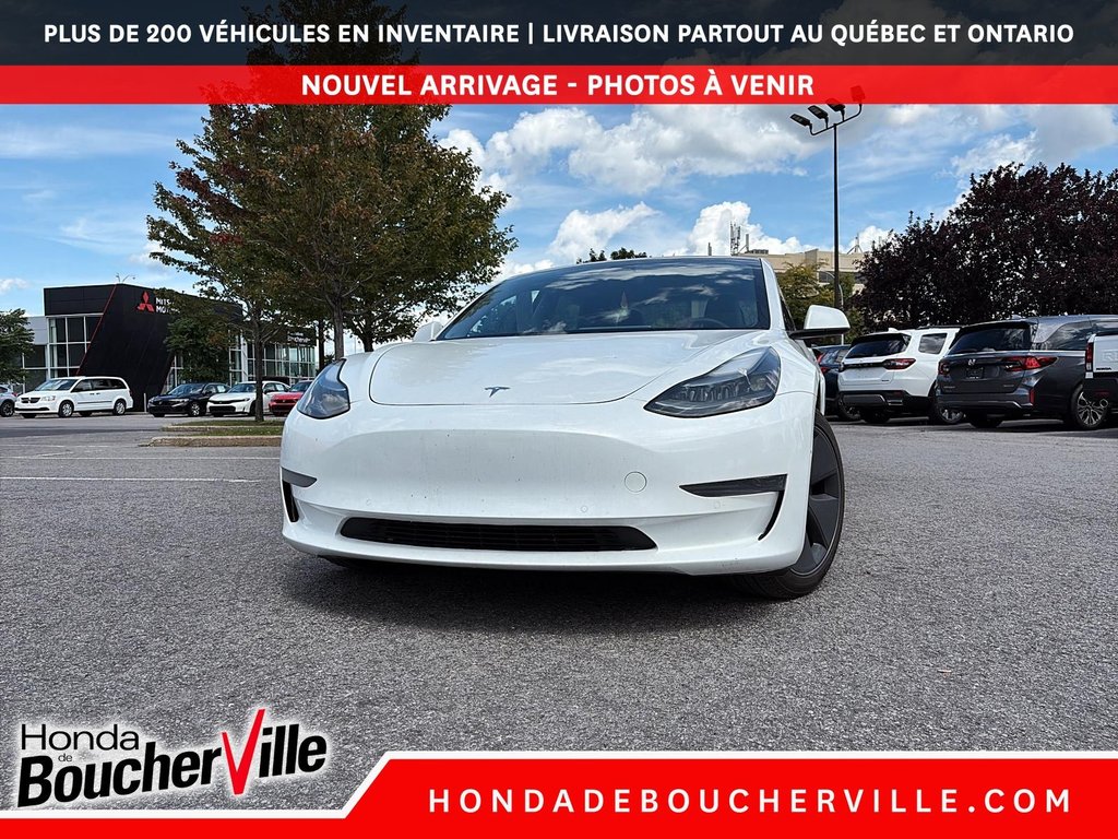 2021 Tesla Model 3 STANDARD RANGE PLUS in Terrebonne, Quebec - 2 - w1024h768px