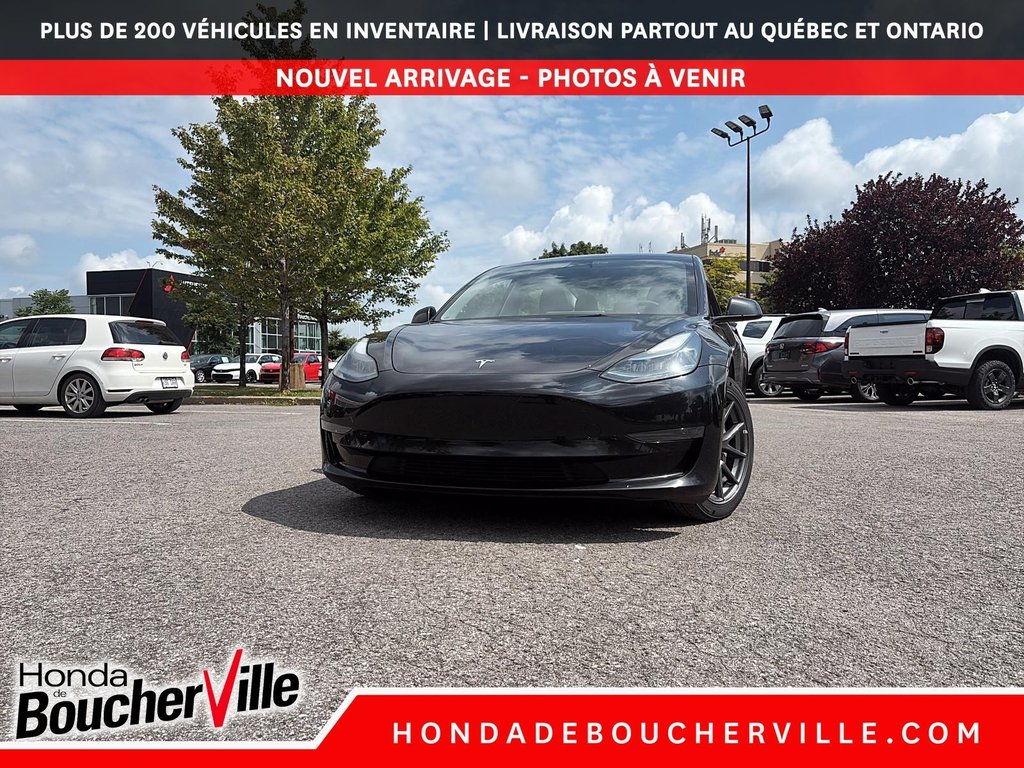 2023 Tesla Model 3 STANDARD RANGE PLUS in Terrebonne, Quebec - 4 - w1024h768px