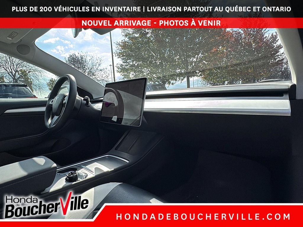 2023 Tesla Model 3 STD RANGE + in Terrebonne, Quebec - 19 - w1024h768px