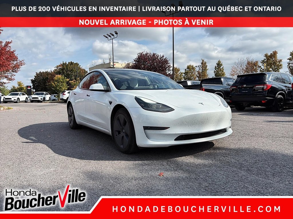 2023 Tesla Model 3 STD RANGE + in Terrebonne, Quebec - 11 - w1024h768px