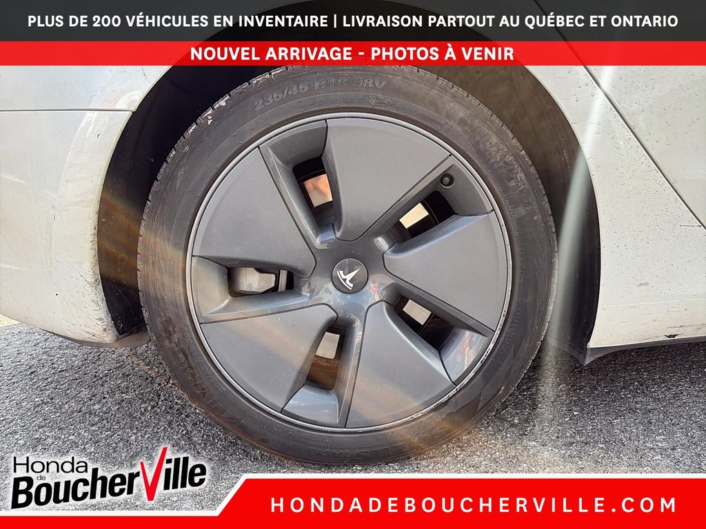 2023 Tesla Model 3 STD RANGE + in Terrebonne, Quebec - 15 - w1024h768px