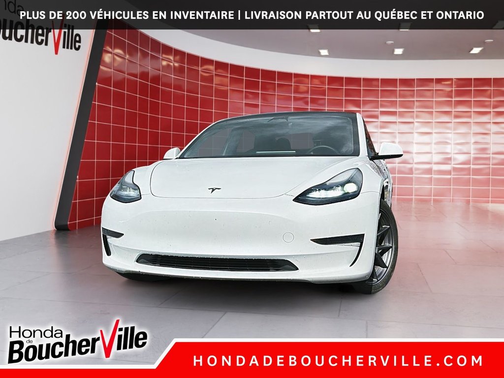 2023 Tesla Model 3 STANDARD RANGE PLUS in Terrebonne, Quebec - 2 - w1024h768px