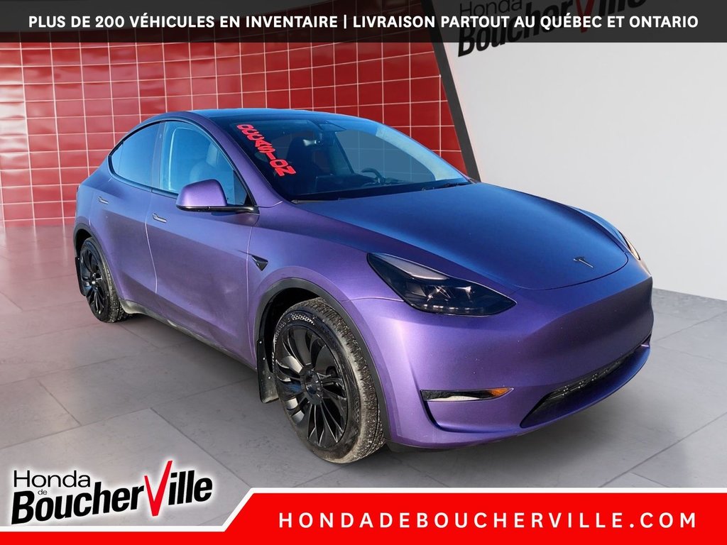 2023 Tesla Model Y RWD in Terrebonne, Quebec - 5 - w1024h768px