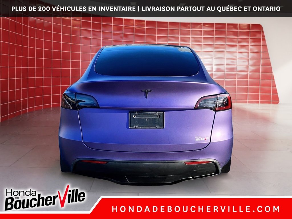 2023 Tesla Model Y RWD in Terrebonne, Quebec - 9 - w1024h768px