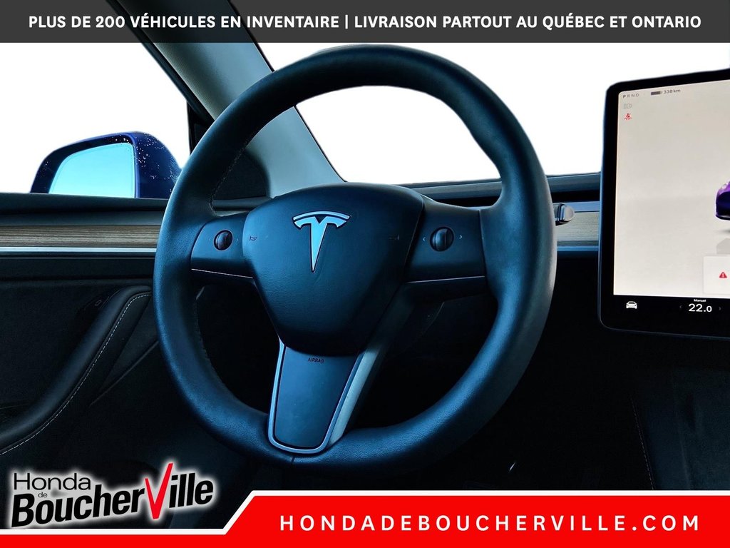 2023 Tesla Model Y RWD in Terrebonne, Quebec - 23 - w1024h768px