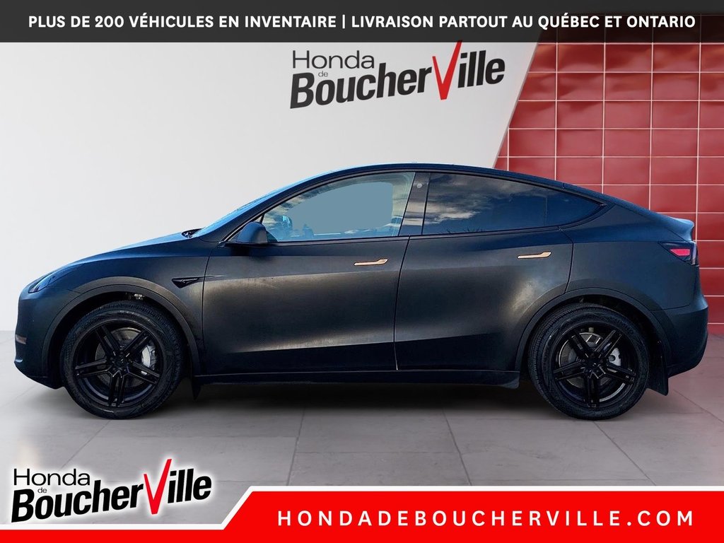 2023 Tesla Model Y RWD in Terrebonne, Quebec - 15 - w1024h768px