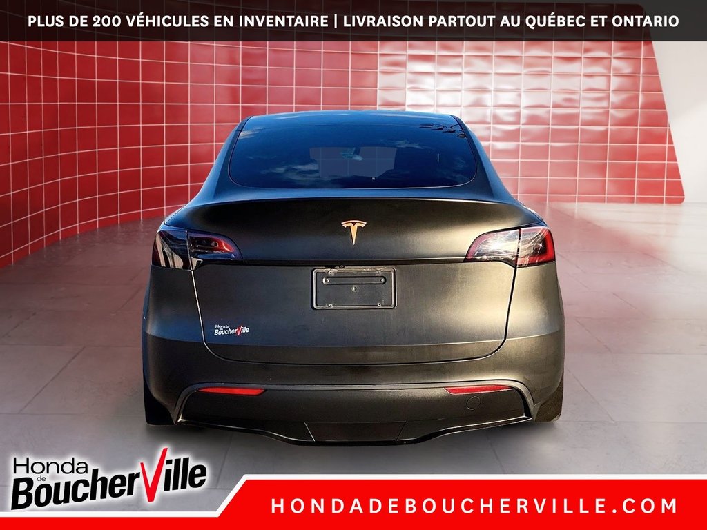 2023 Tesla Model Y RWD in Terrebonne, Quebec - 11 - w1024h768px