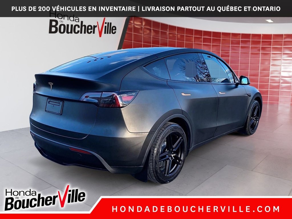 2023 Tesla Model Y RWD in Terrebonne, Quebec - 13 - w1024h768px