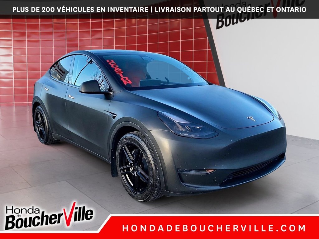 2023 Tesla Model Y RWD in Terrebonne, Quebec - 5 - w1024h768px