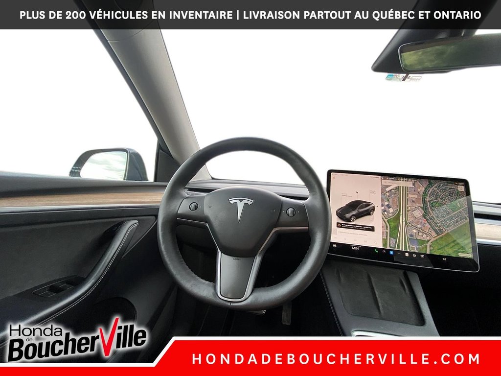 2023 Tesla Model Y RWD in Terrebonne, Quebec - 23 - w1024h768px