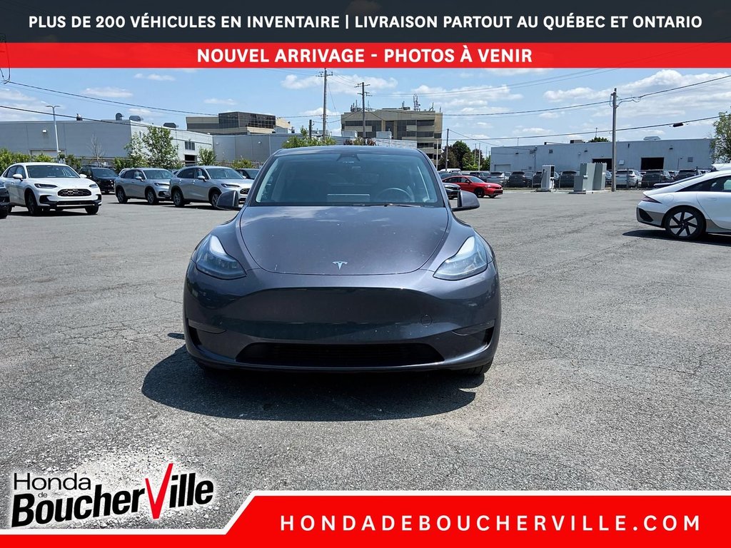 2023 Tesla Model Y RWD in Terrebonne, Quebec - 3 - w1024h768px