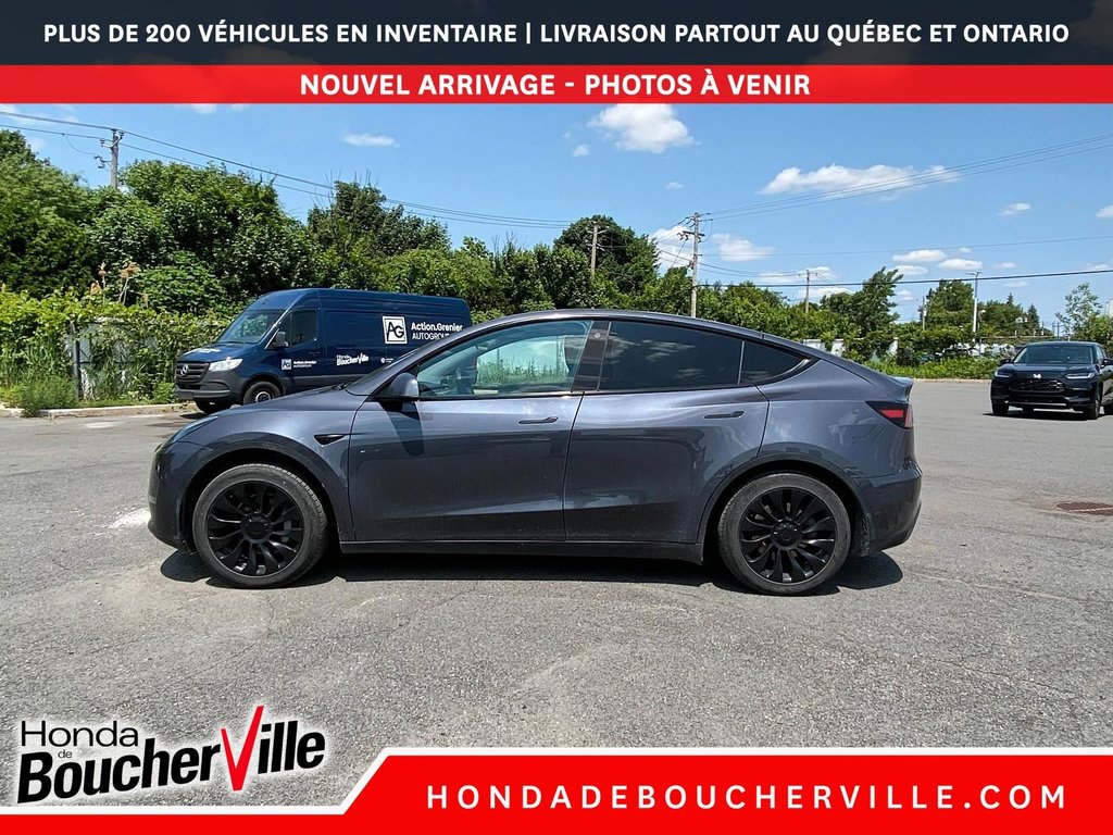 2023 Tesla Model Y RWD in Terrebonne, Quebec - 15 - w1024h768px