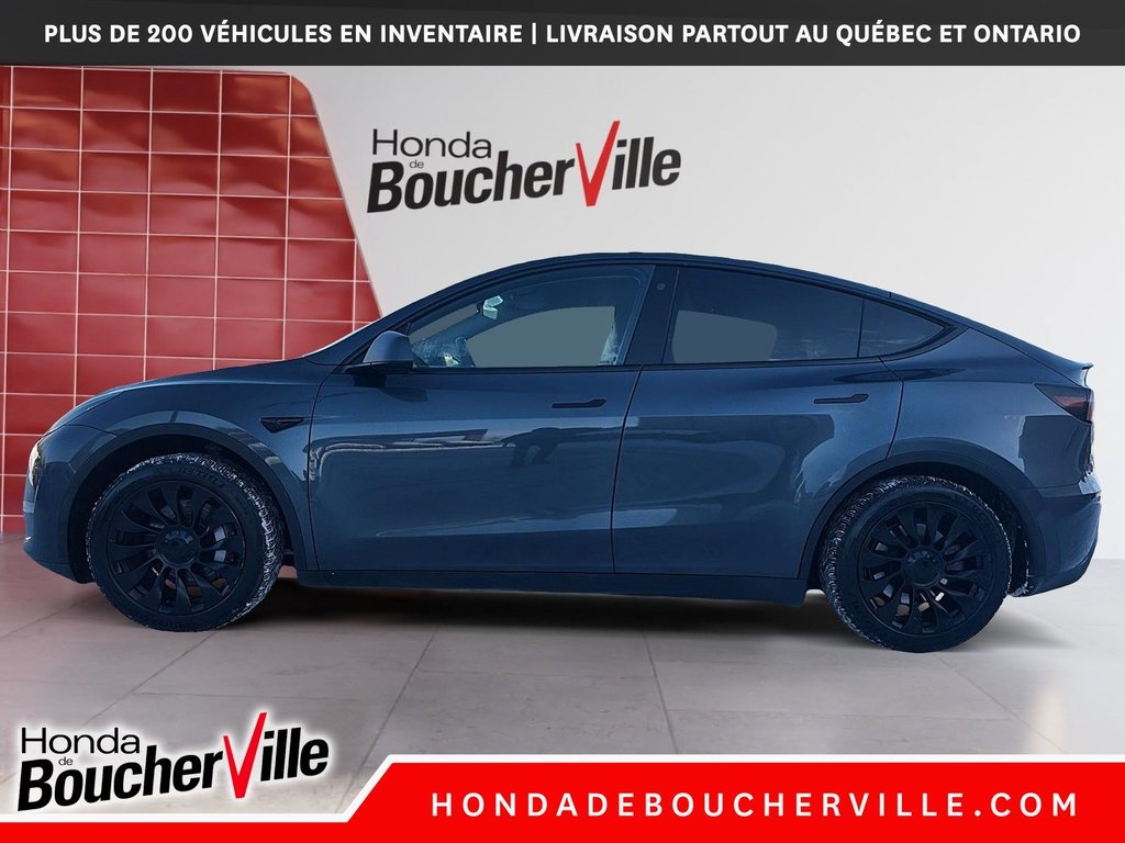 2023 Tesla Model Y RWD in Terrebonne, Quebec - 3 - w1024h768px