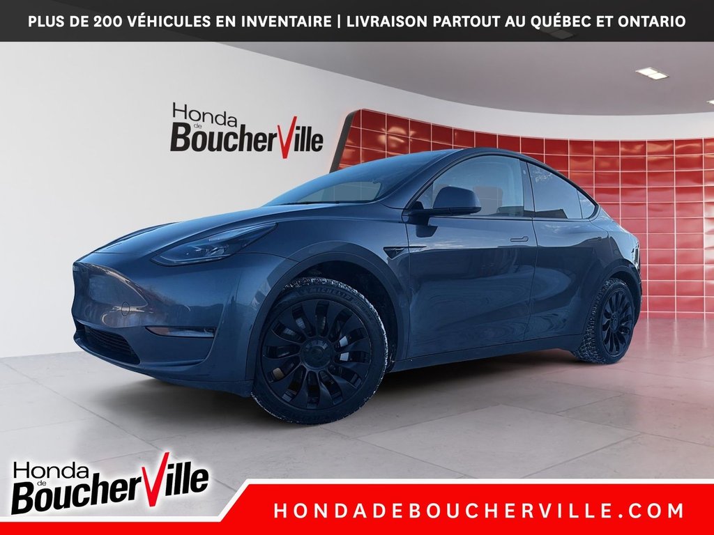 2023 Tesla Model Y RWD in Terrebonne, Quebec - 1 - w1024h768px