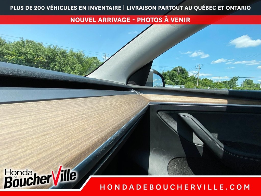 2023 Tesla Model Y RWD in Terrebonne, Quebec - 25 - w1024h768px