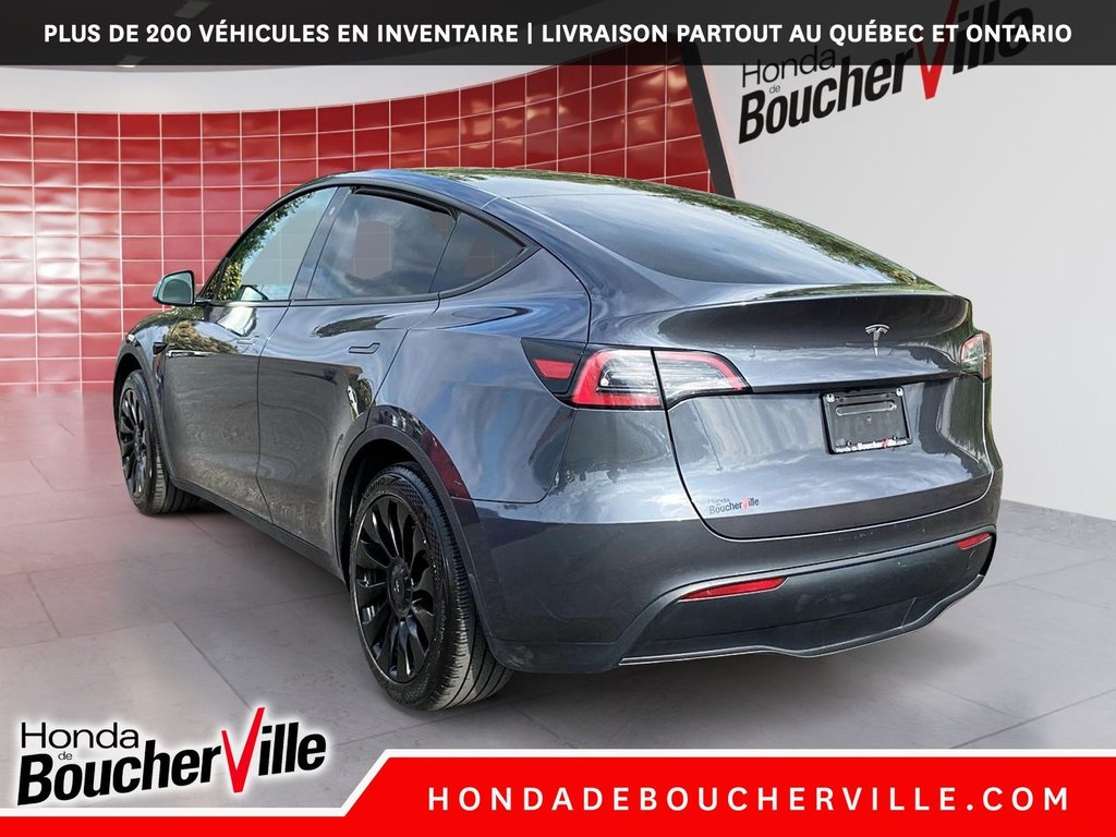 2023 Tesla Model Y RWD in Terrebonne, Quebec - 13 - w1024h768px