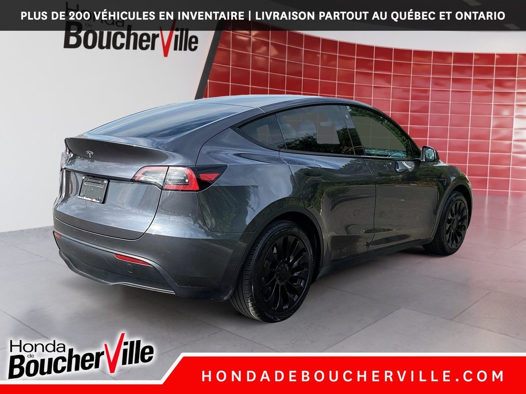 2023 Tesla Model Y RWD in Terrebonne, Quebec - 9 - w1024h768px
