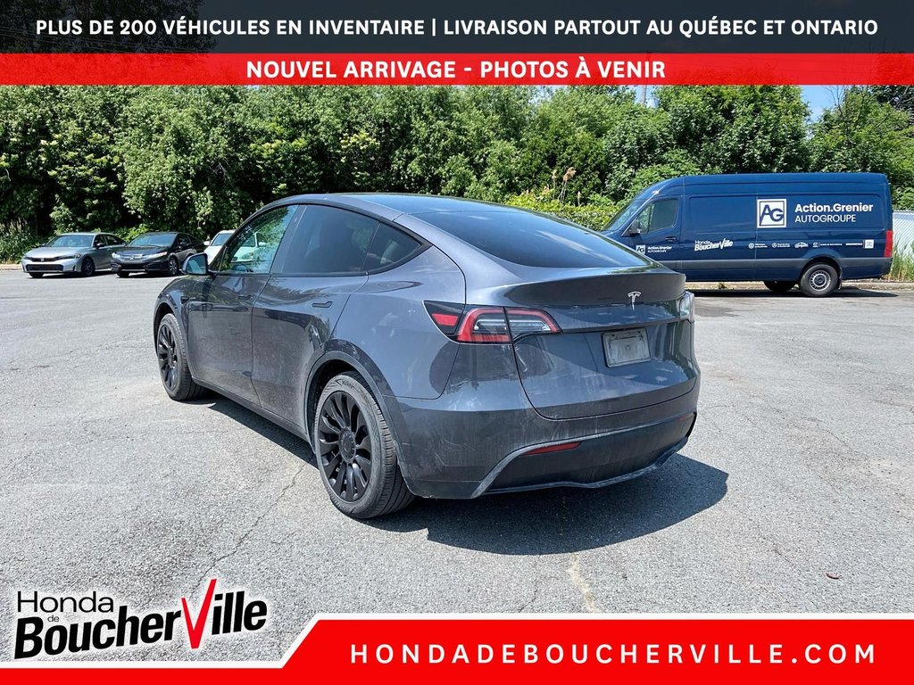 2023 Tesla Model Y RWD in Terrebonne, Quebec - 13 - w1024h768px