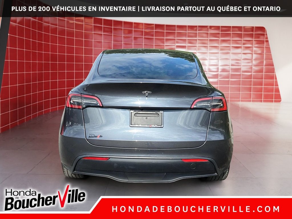 2023 Tesla Model Y RWD in Terrebonne, Quebec - 11 - w1024h768px