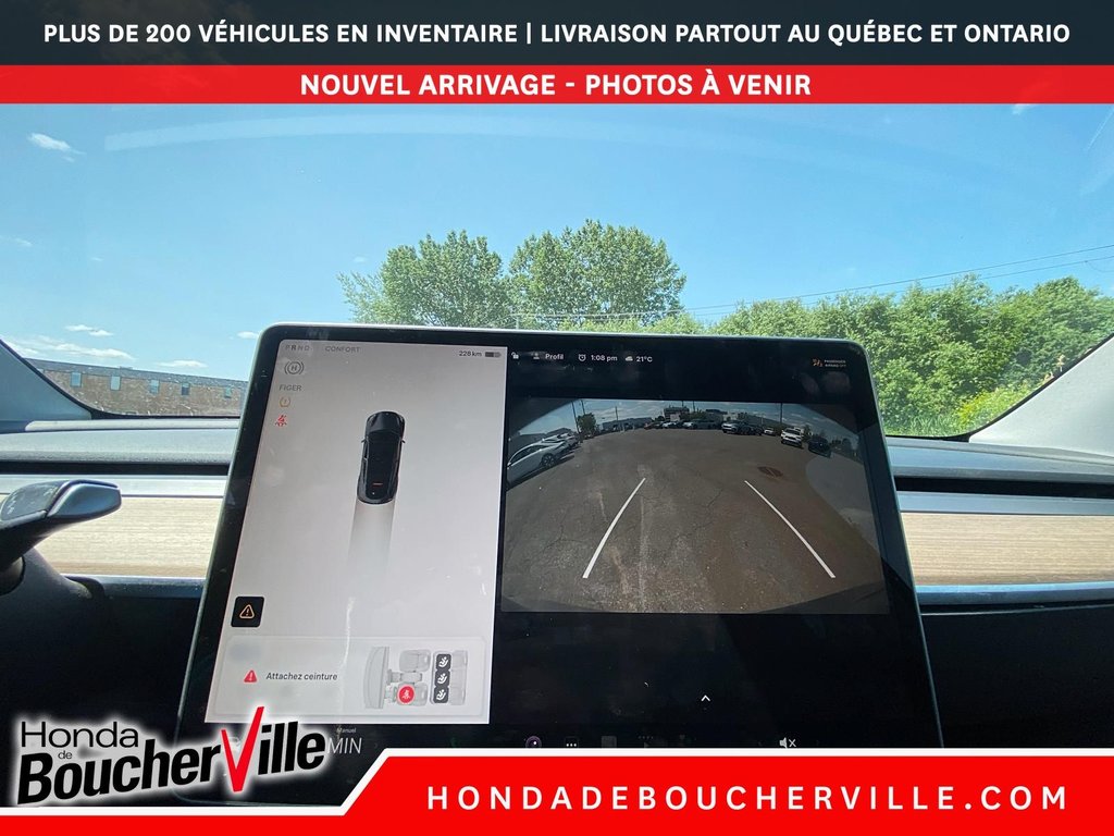 2023 Tesla Model Y RWD in Terrebonne, Quebec - 29 - w1024h768px