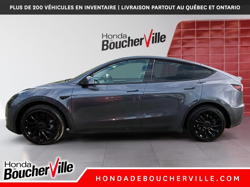2023 Tesla Model Y RWD in Terrebonne, Quebec - 15 - w1024h768px