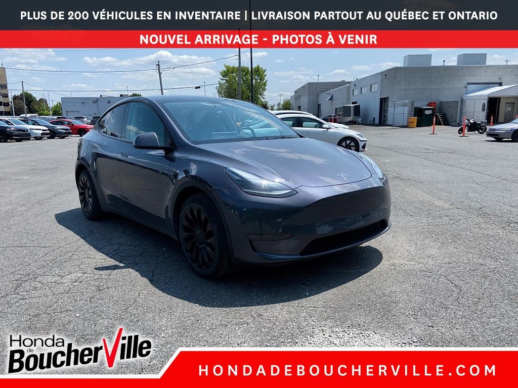 2023 Tesla Model Y RWD in Terrebonne, Quebec - 5 - w1024h768px