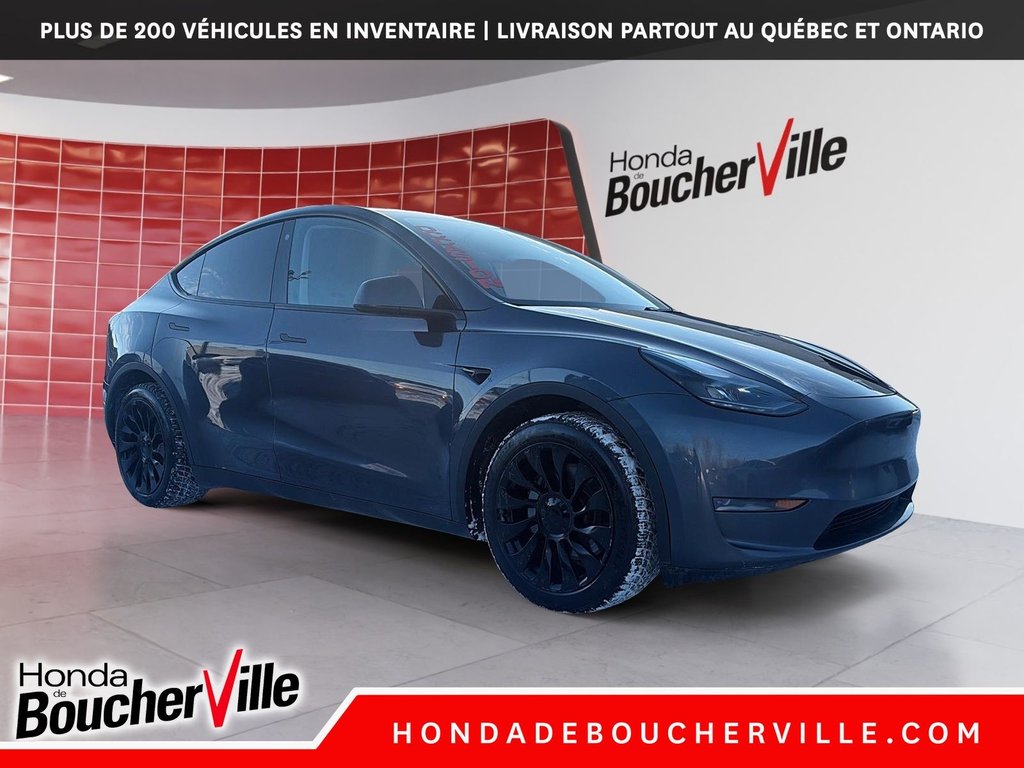 2023 Tesla Model Y RWD in Terrebonne, Quebec - 11 - w1024h768px