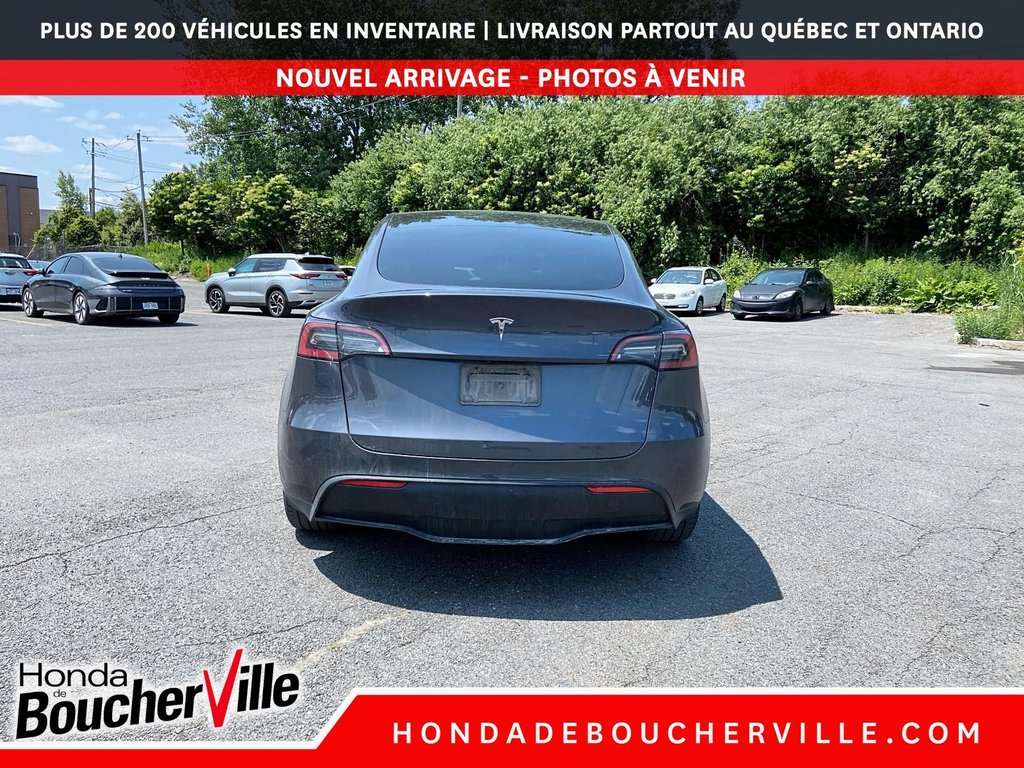 2023 Tesla Model Y RWD in Terrebonne, Quebec - 11 - w1024h768px