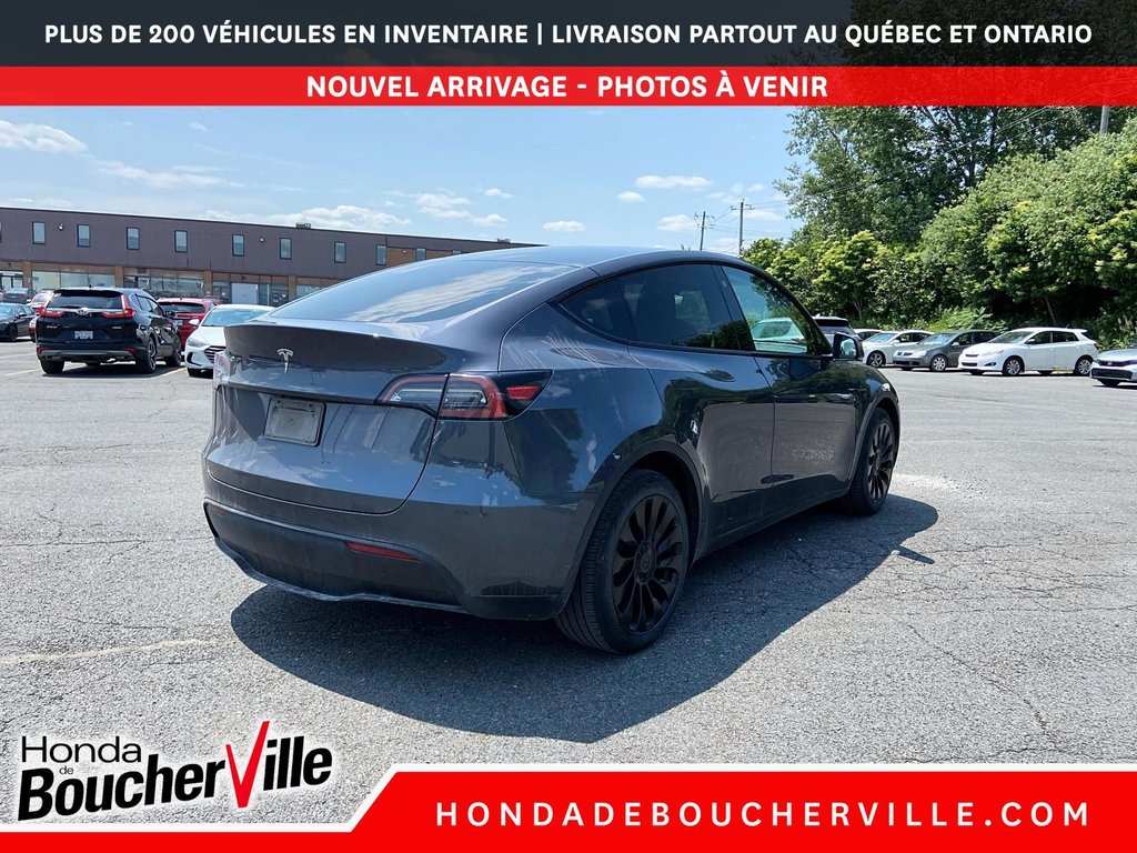 2023 Tesla Model Y RWD in Terrebonne, Quebec - 9 - w1024h768px
