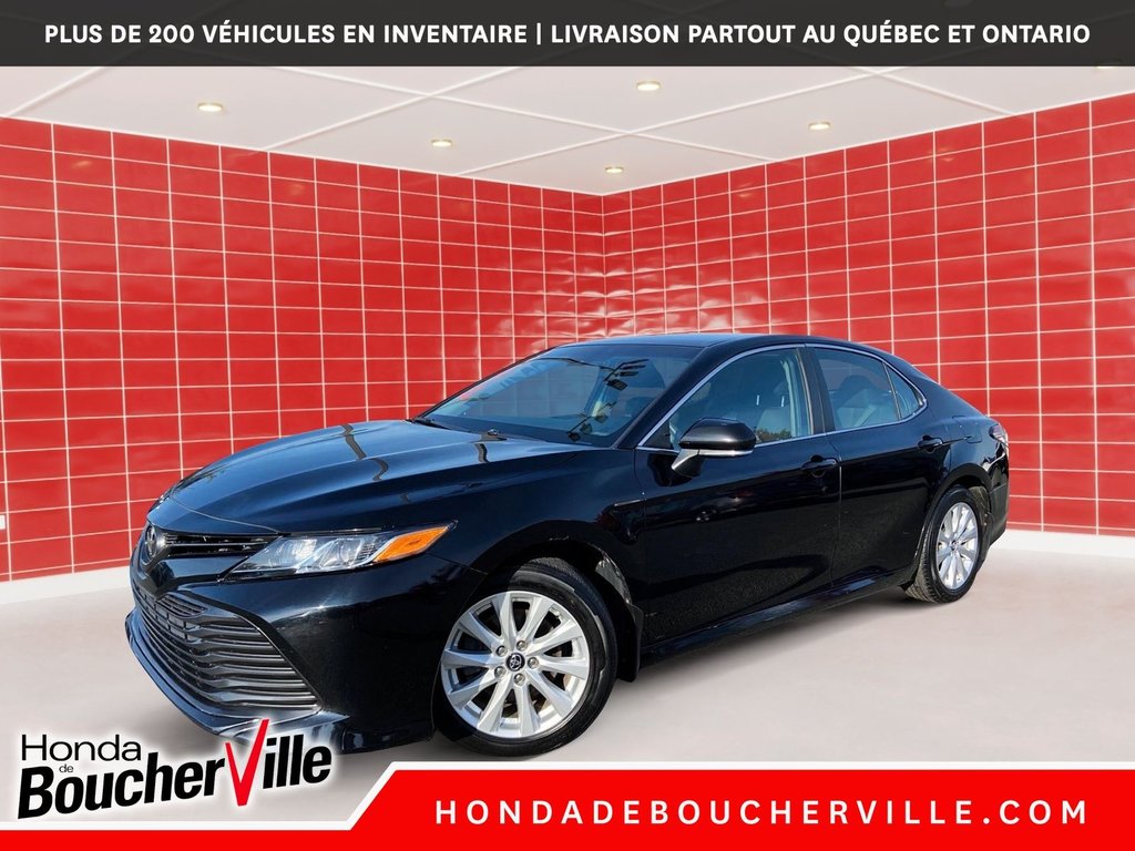 2018 Toyota Camry LE in Terrebonne, Quebec - 1 - w1024h768px